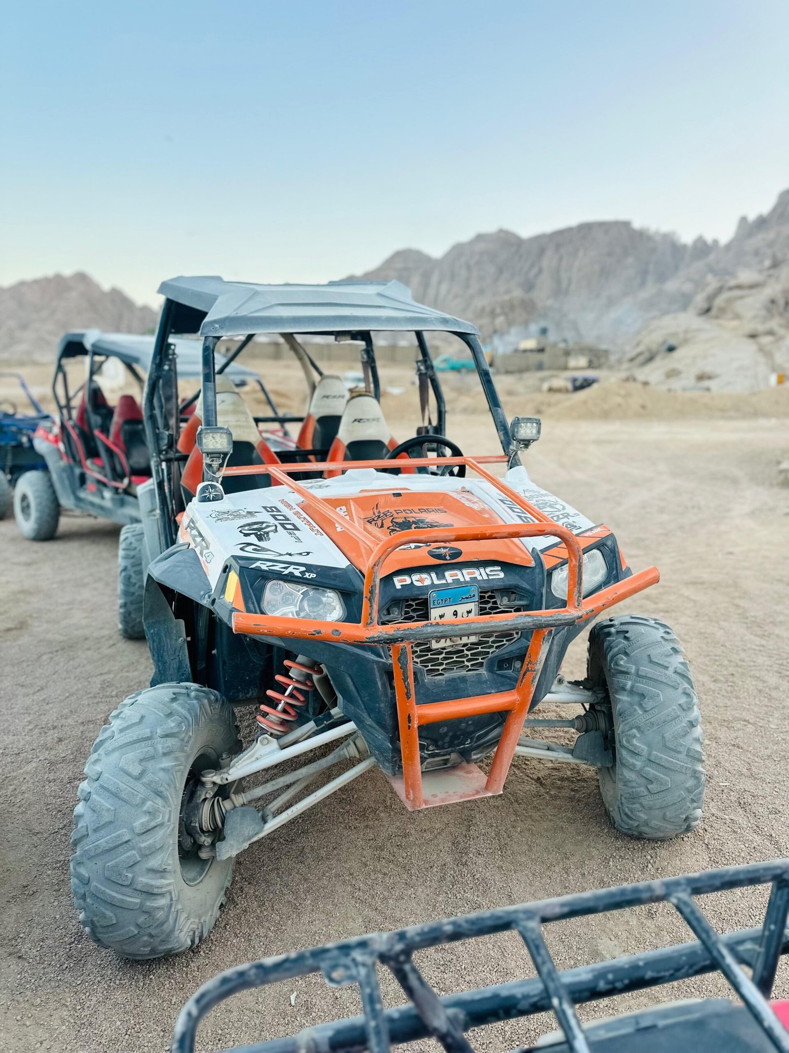 Tourists enjoying a 5-in-1 Safari Adventure in Sharm El Sheikh with buggy ride, Bedouin show, dinner, and stargazing. hasabo travel